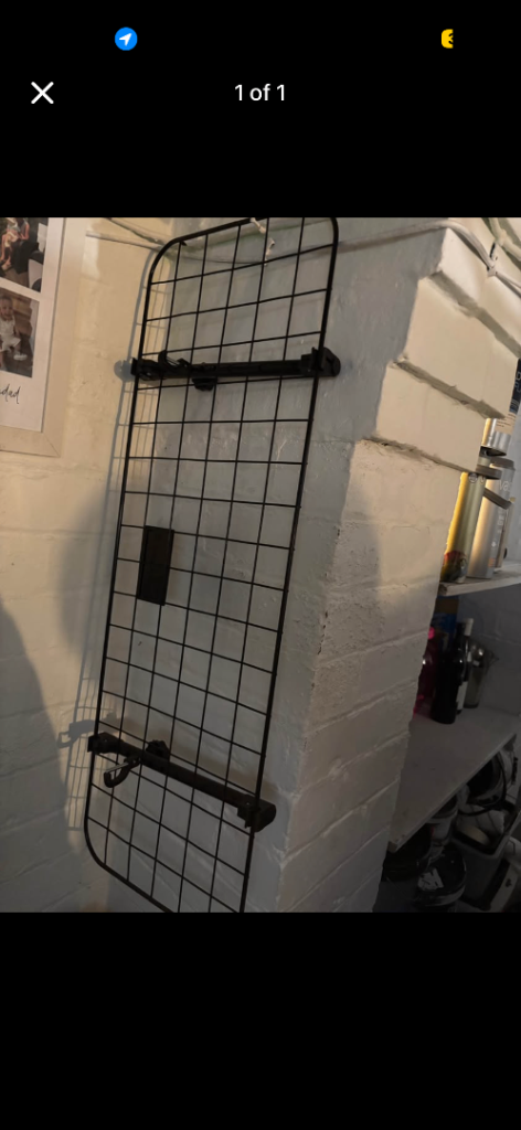 Dog guard for car boot. 