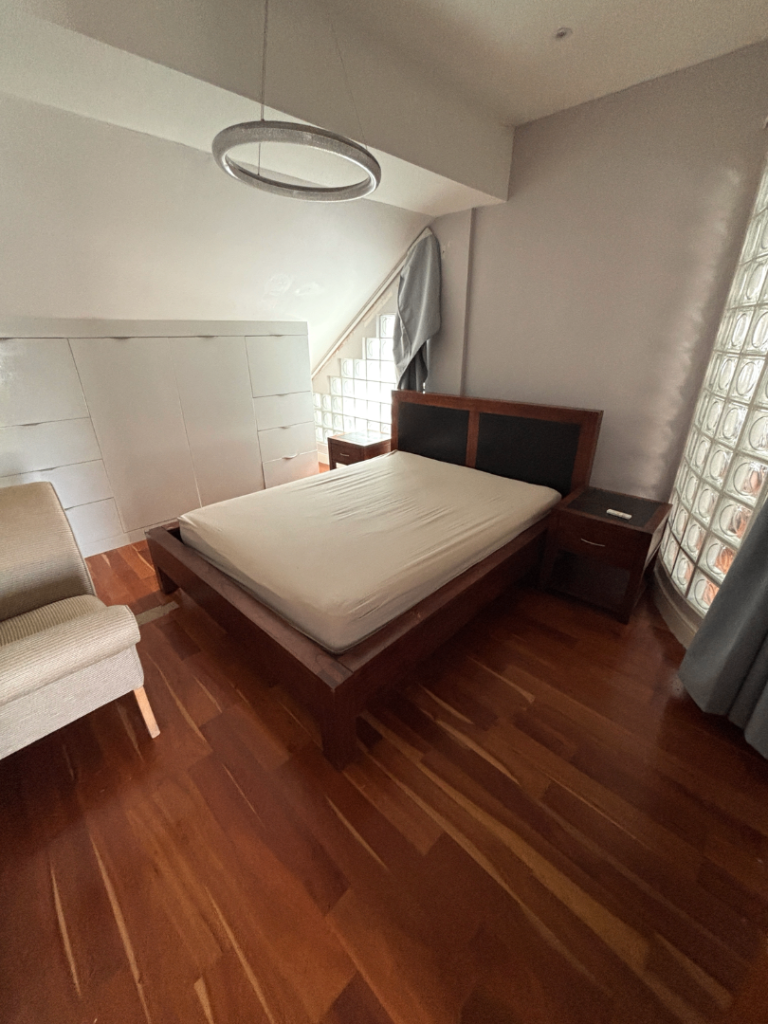 Double bedroom in a penthouse modern apartment.