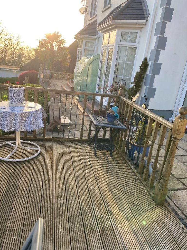 Wooden decking with 7 posts and 47 spindles