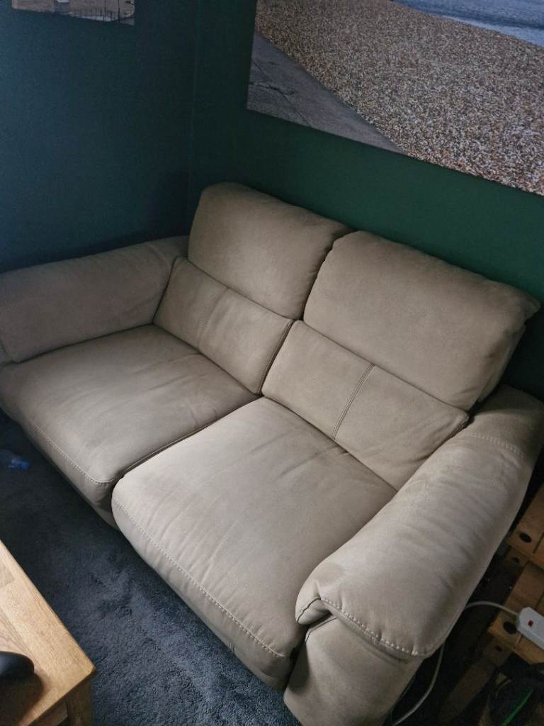 Comfortable Beige Two-Seater Sofa – Good Condition
