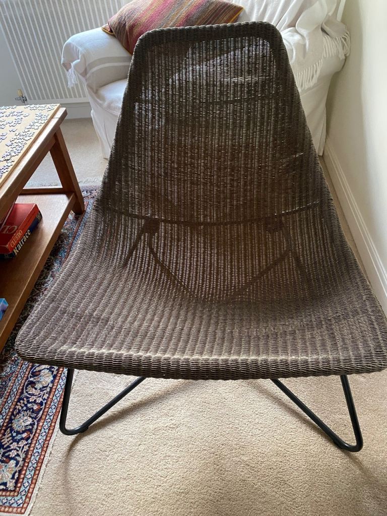 Brown Rattan Chair with black metal frame