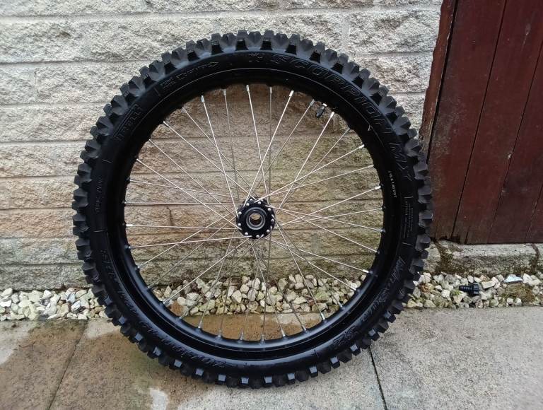 SUR-RON WHEEL WITH SCORPION MX TYRE. GOOD AS NEW!