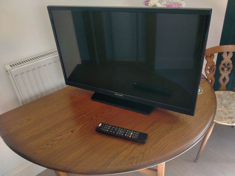Sharp 32" LED television with stand and remote