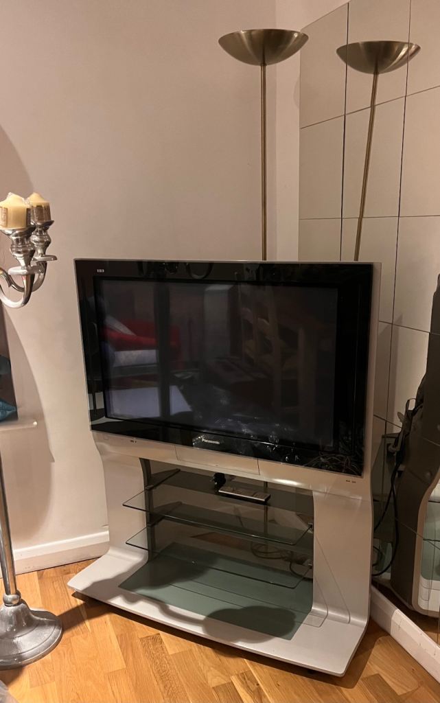 image for Panasonic Large Tv built into silver stand on wheels 