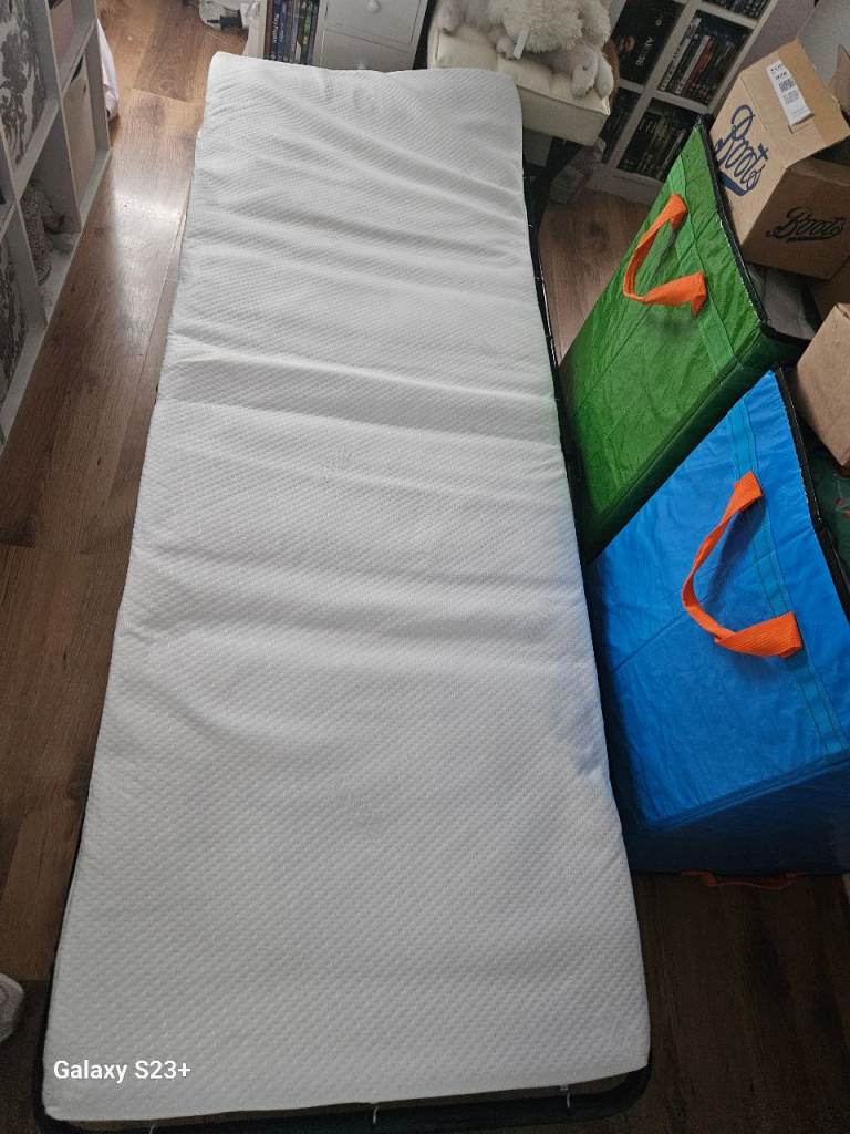 Folding guest beds x2