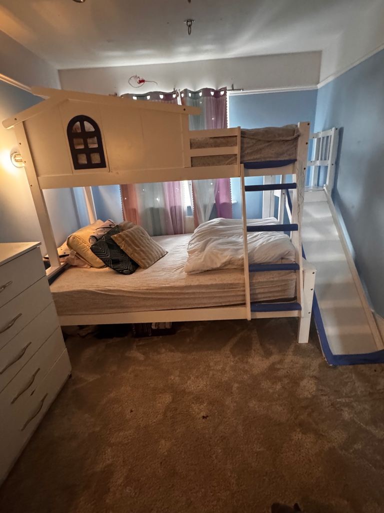 Triple bunk bed with house and slide – Good Condition