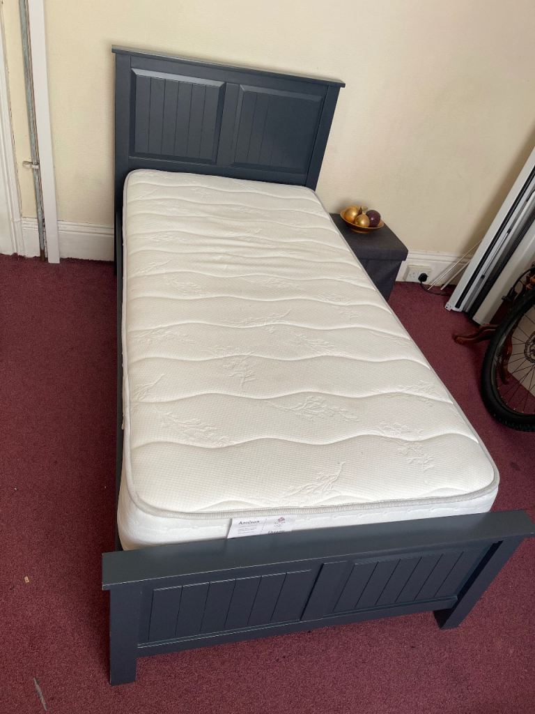 Dreams single grey wooden bed only six months old.