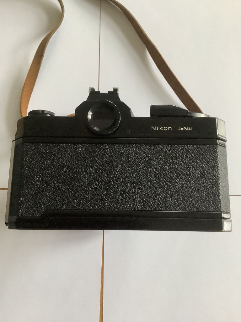 Nikon Nikkormat FT2 Film Camera and Unomat Flashgun and Coloured Filters.