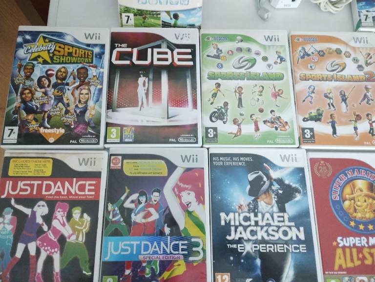 Nintendo Wii Console With Boxed Family Trainer 25 Games And Accessories In Good Condition £100