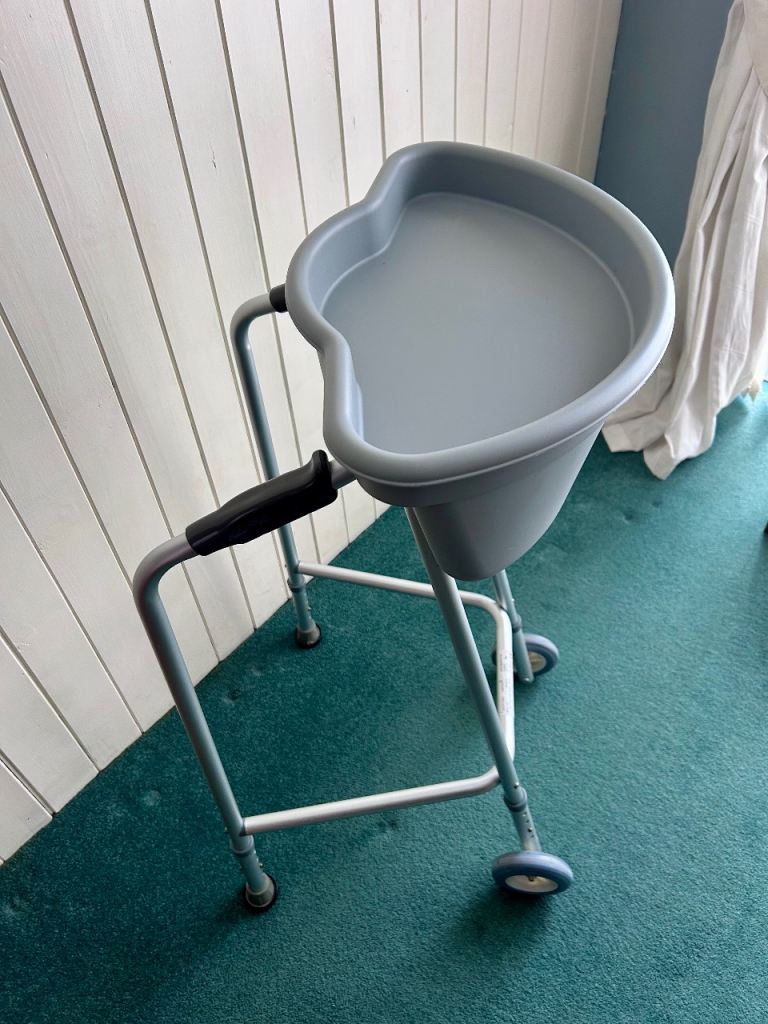Lightweight Slimline Walking Frame With Caddy And Cup Holder