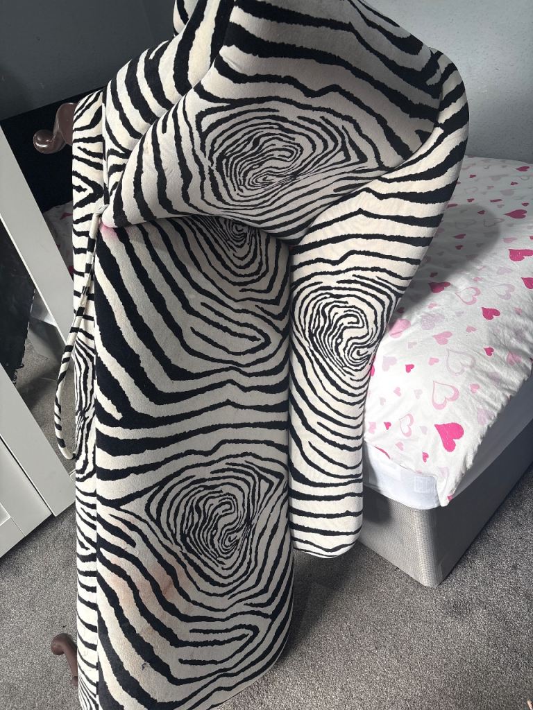 Zebra Print Swivel Armchair – Good Condition