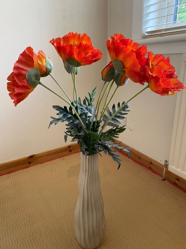 Vase with poppies