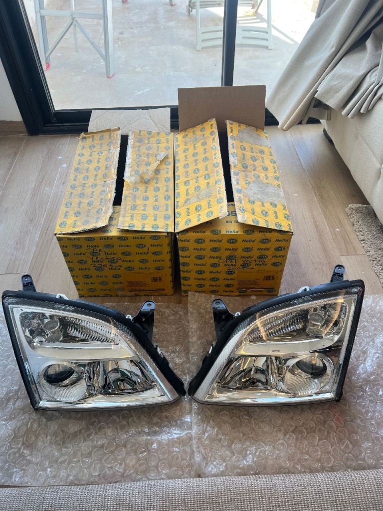 Hella Opel Vectra Headlight Set Left+Right