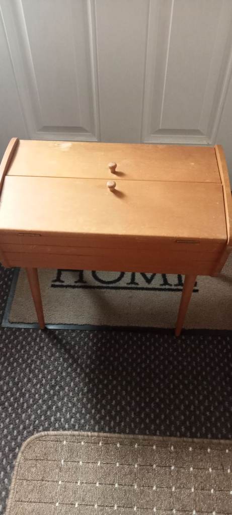 vintage sewing box with accessories.