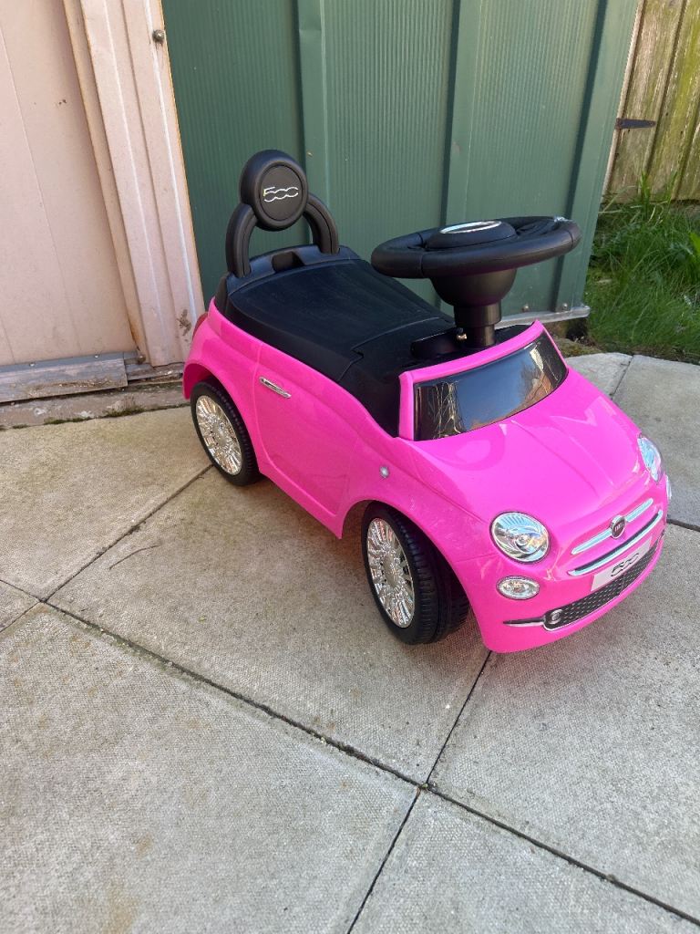 Pink fiat 500 toy car for kids to sit and ride 