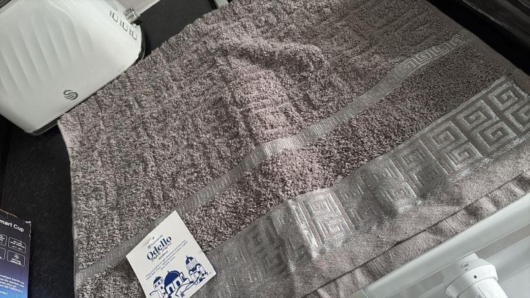 Grey Greek key hand towel 