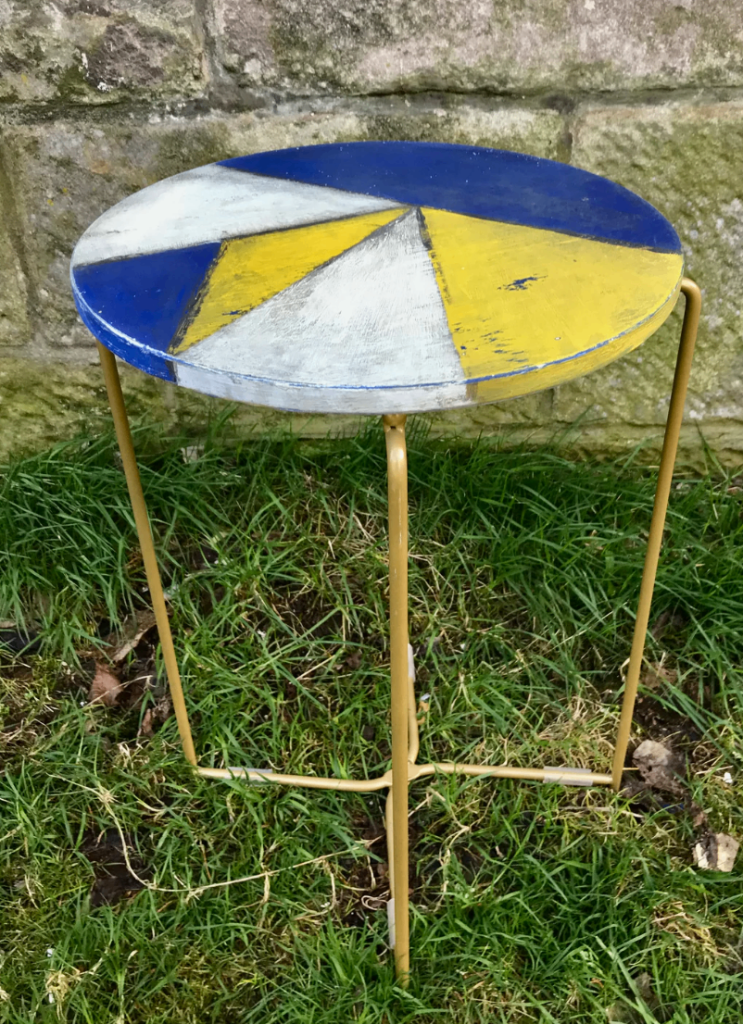 Geometric painted side table