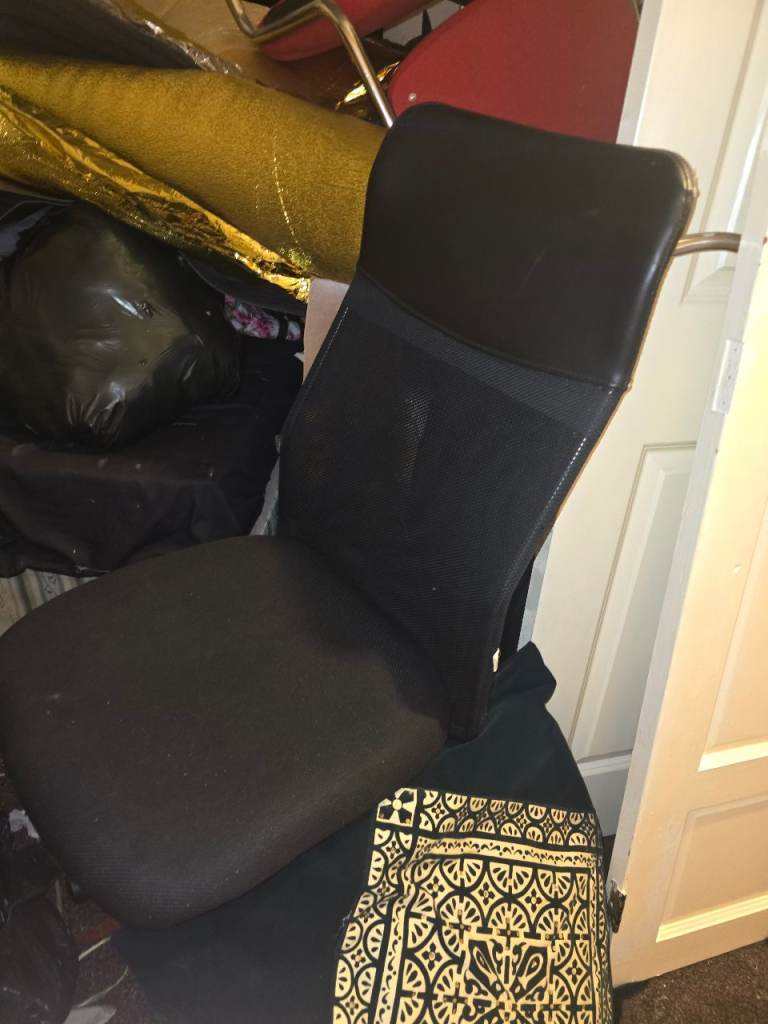 2 x black swirling office chairs