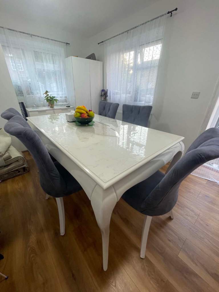 White Dining Table with 5 Grey Velvet Chairs – Good Condition