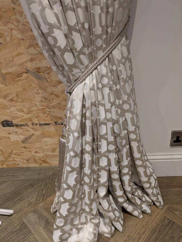 Pair of full length professionally made curtains in Belfield Santorini parchment fabric
