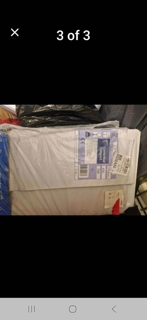 2 New Radiators (original packaging) & 5 new TRV's heads.