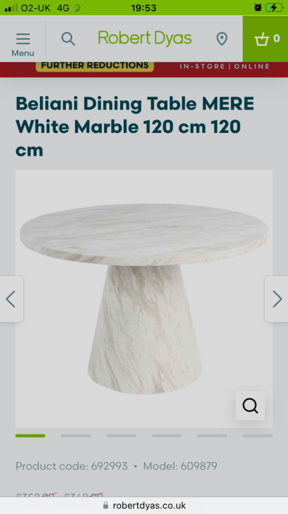 Beliani round dining table 