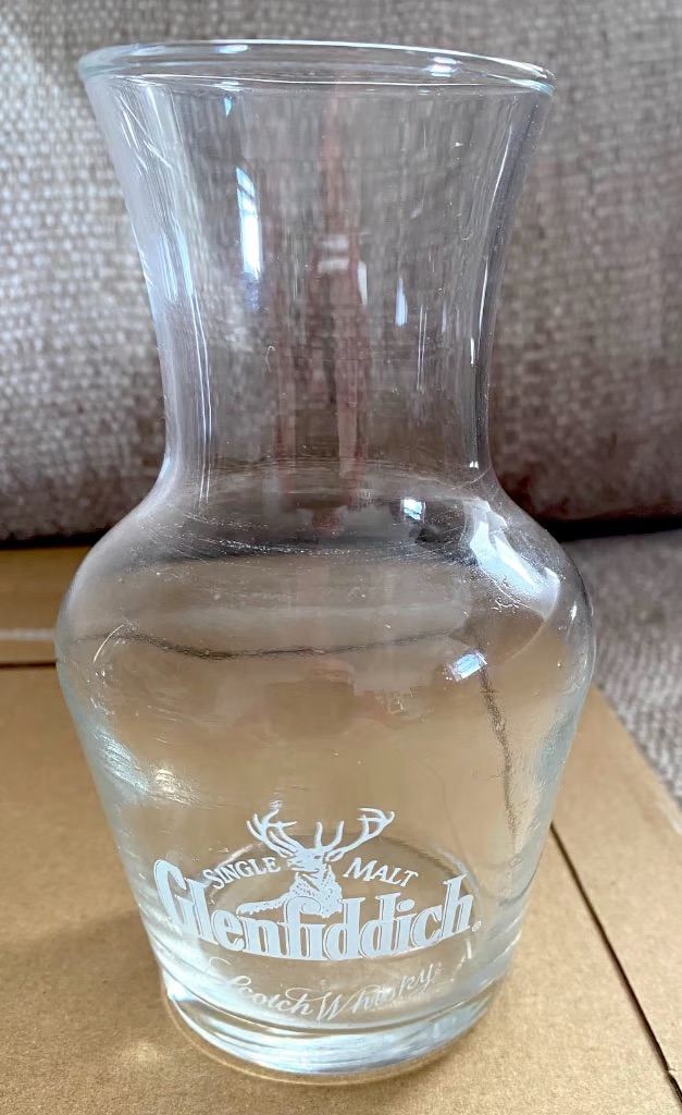 Various Scotch Whisky collectibles. Nosing glasses, water jugs etc. 