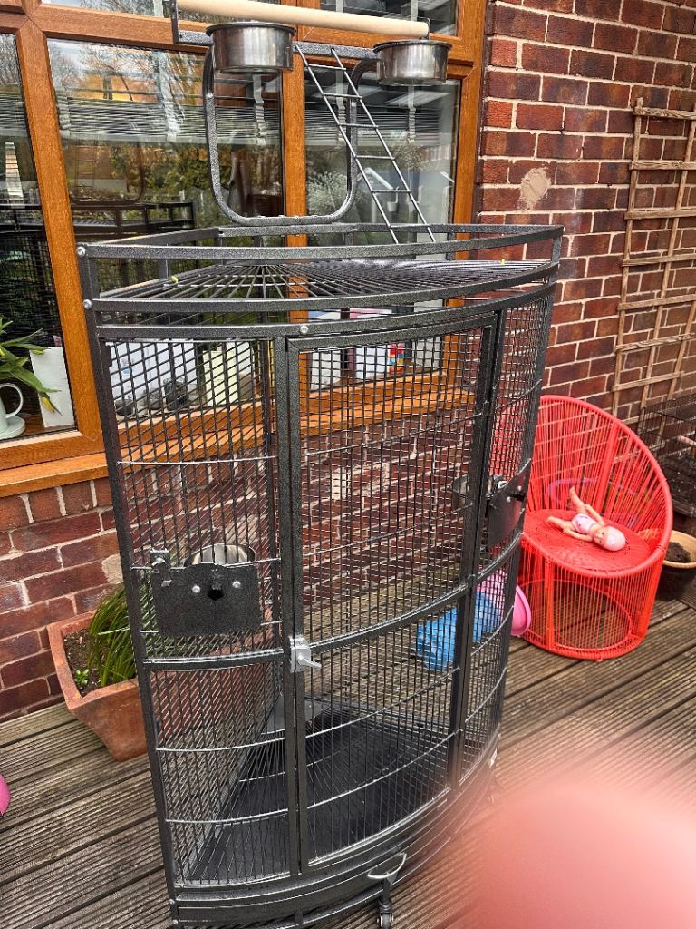Corner bird cage