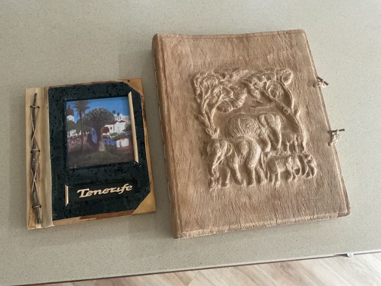 Two wooden photo albums - one Tenerife and one with jungle animals on cover
