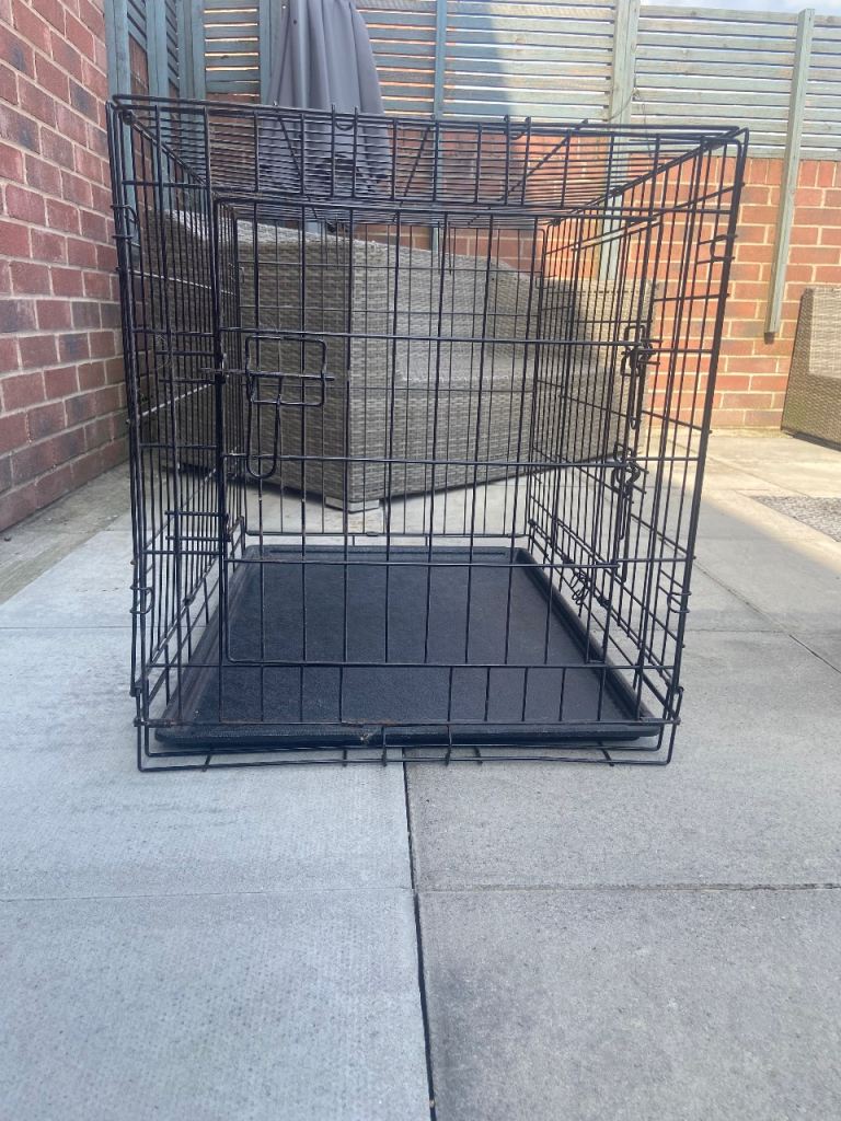 2 medium black dog cages (sold separately)