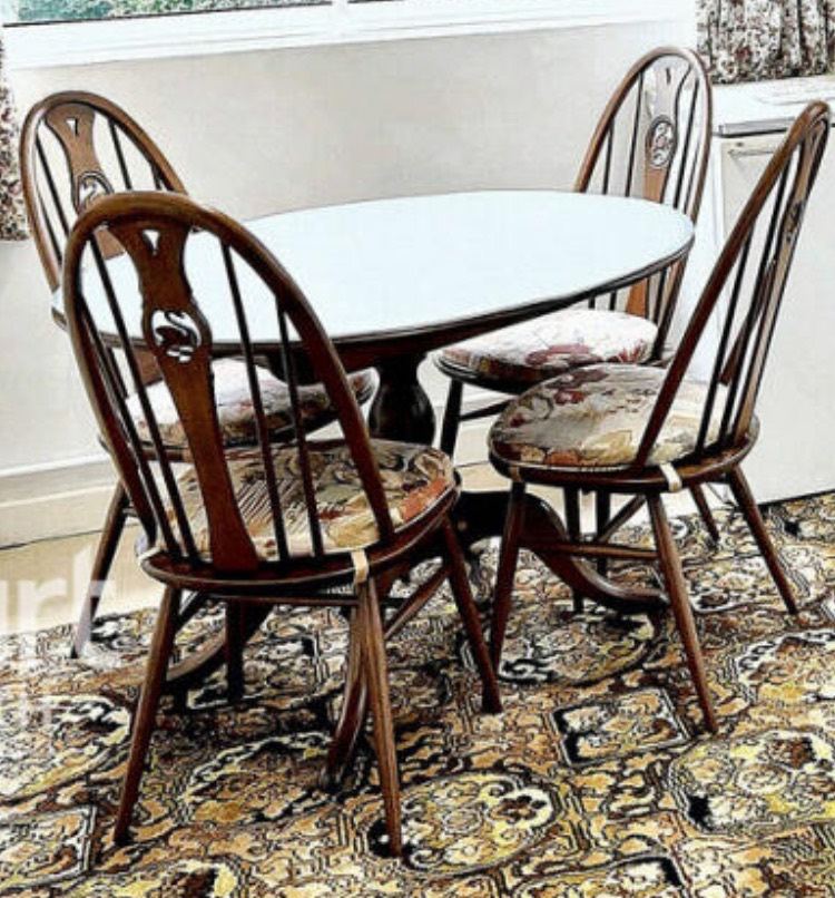 Ercol swan table and chairs circular with extra leaf 
