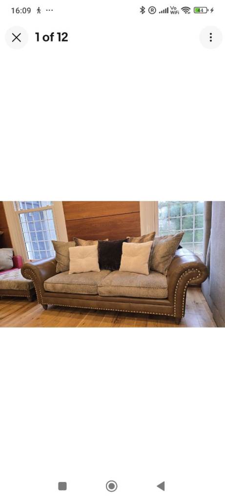 Quality Alexander and James leather and fabric sofa and footstool purchased from Barker &stonehouse
