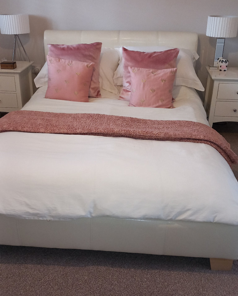 Double bed with faux leather headboard and base for sale. 