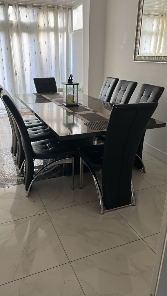Large dining table and chairs