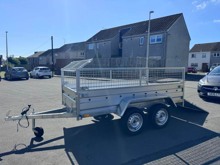 BRAND NEW 7,7ft x 4,2ft (B235) TWIN AXLE NIEWIADOW TRAILER WITH 40 CM MESH AND RAMP 750KG