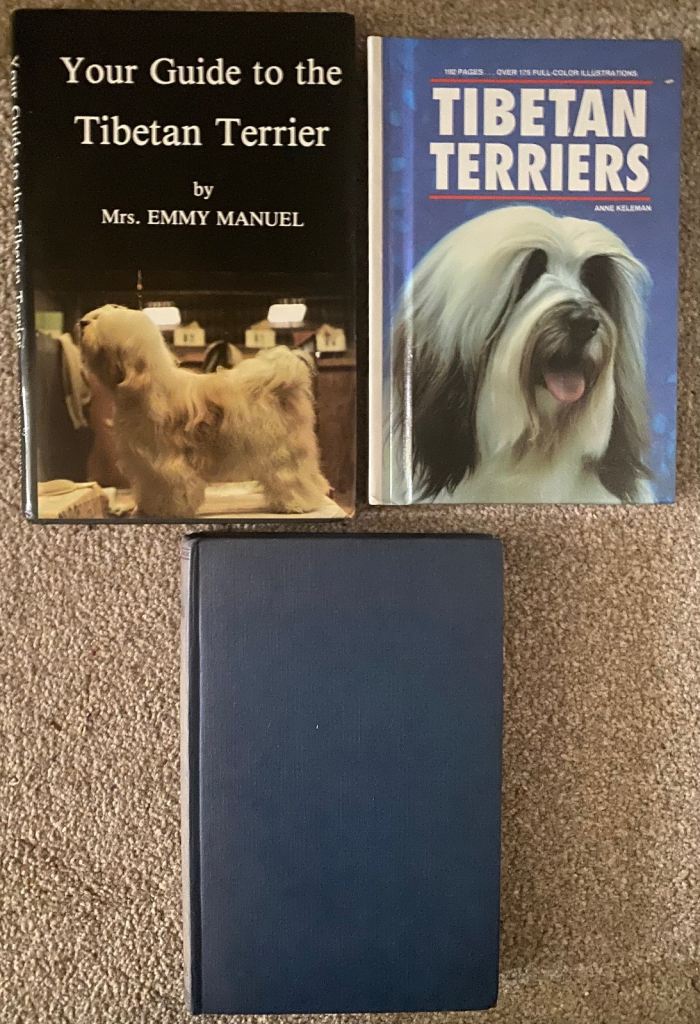 Tibetan Terrier and vintage diving books