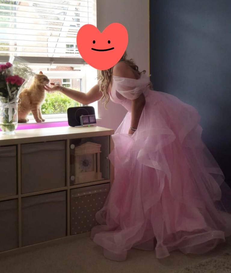 Prom Dress - adjustable from size 8-14 with the back fastening it has.