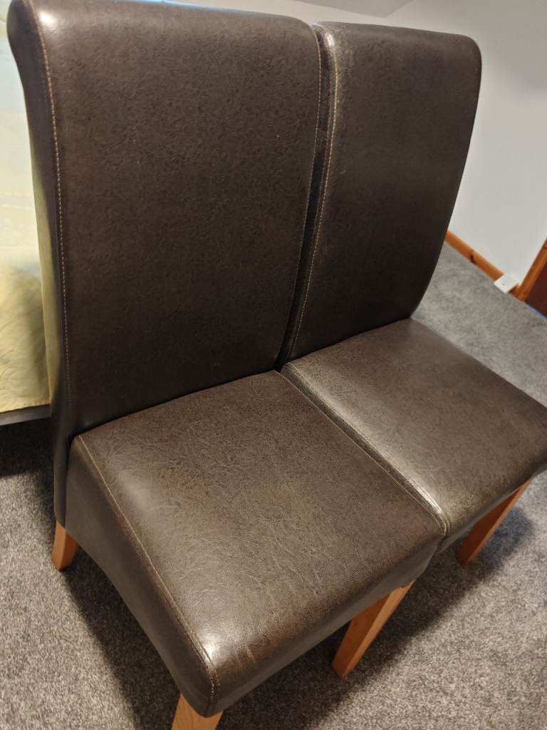 2 Real leather brown dining chairs 