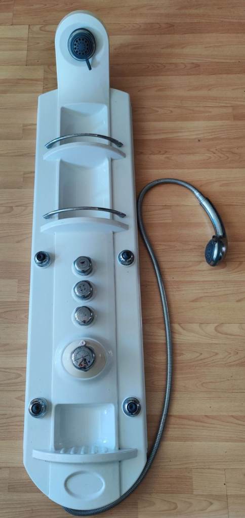 Wall-mounted tower shower. Chrome parts water-marked (!?) and no mountings. Untested.