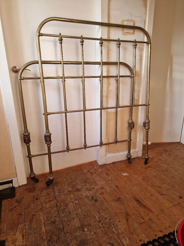 Antique Solid Brass single bed on castors