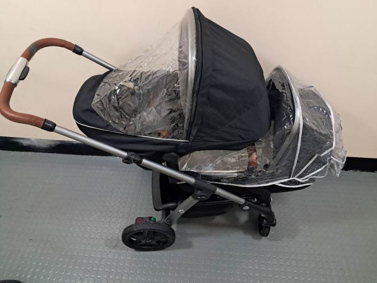Double Buggy Pram – Black, Good Condition with Rain Covers
