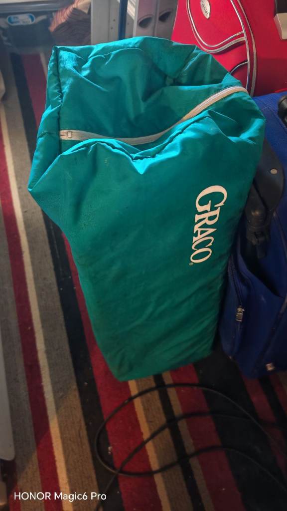 Travel cot in case