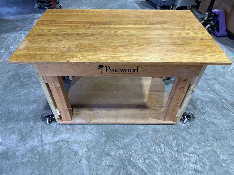Solid Wooden Workbench with solid Oak Top with wheels.
