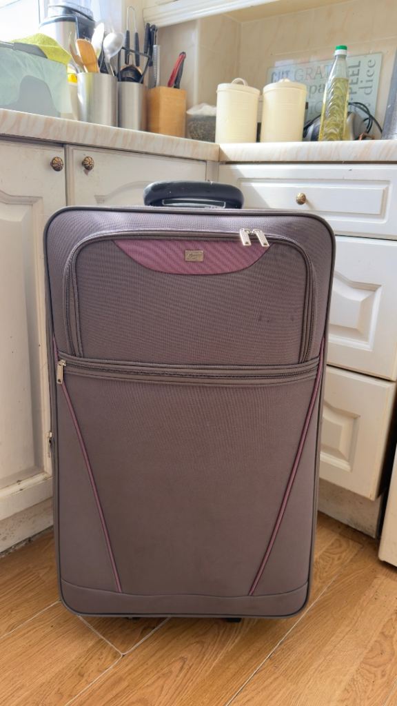 Two Grey Fabric Suitcases – Good Condition, Various Sizes