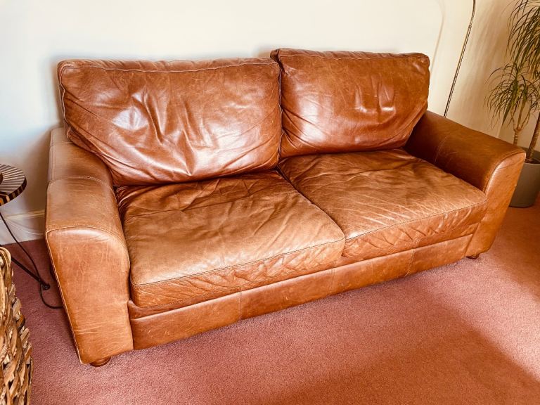 Tan Leather Two-Seater Sofa – Good Condition