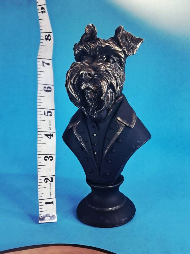 This is a Next Black/Gold Wilson the Schnauzer Ornament- Sculpture 