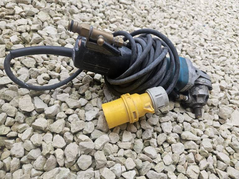 Angle Grinder with 110V Transformer and Yellow Plug