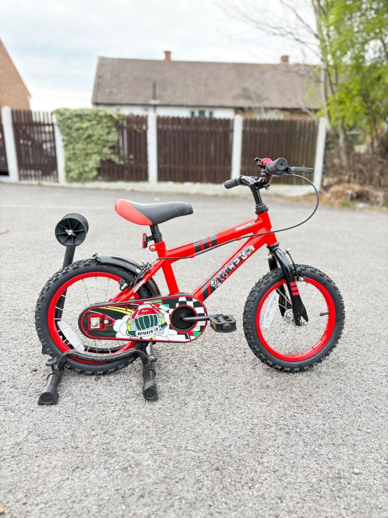 LIKE NEW, PEDAL PALS RACER Child's bike. 14 inch wheels. Fully working. Ready to ride away.