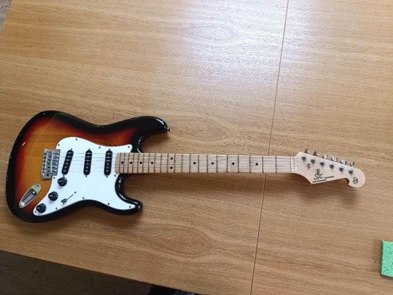 SX electric guitar and Dimarvery guitar wooden storage case - perfect for beginners