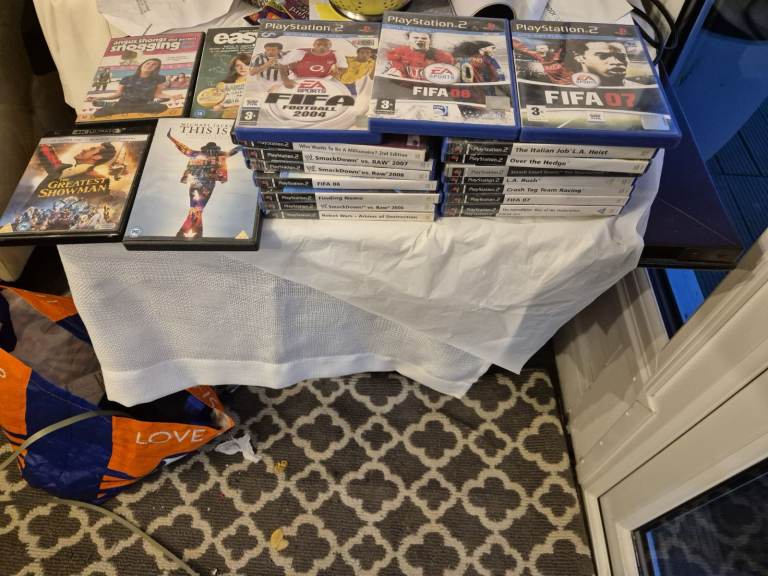 play station games & DVD bundle,FIFA Games, Michael Jackson, Greatest Showman & More 